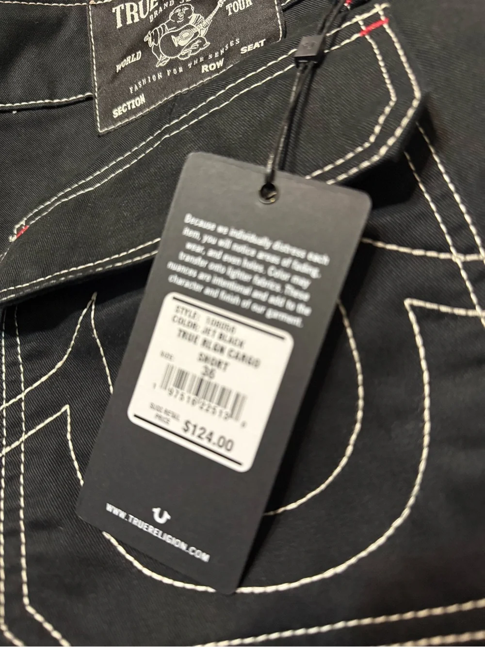 NWT True Religion Men’s Black Jean Shorts with White and Red Contrast.